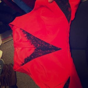 Red and black lace dress with side lace cutouts